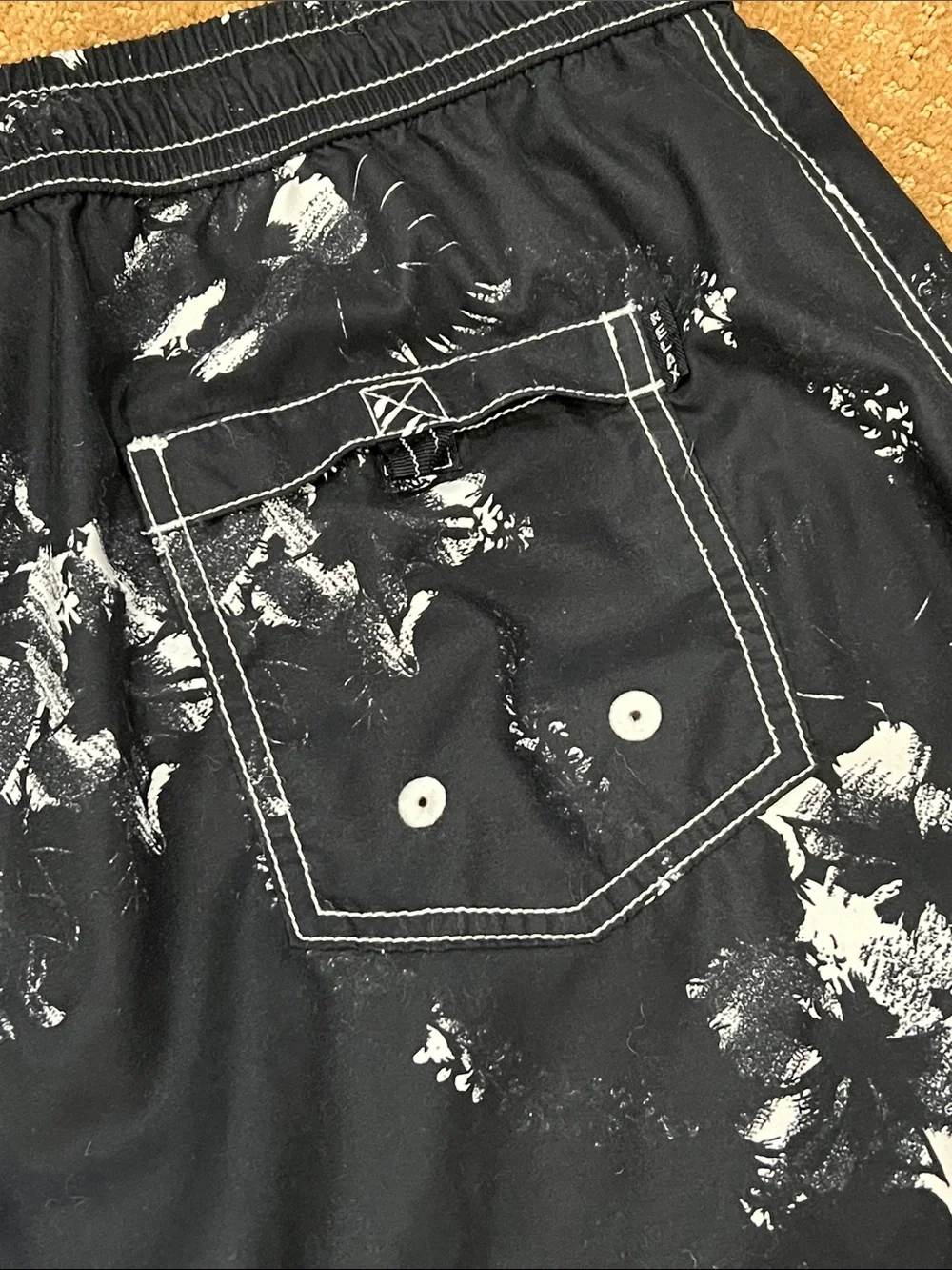 Tommy Bahama Black Swim Trunks with White Floral Print